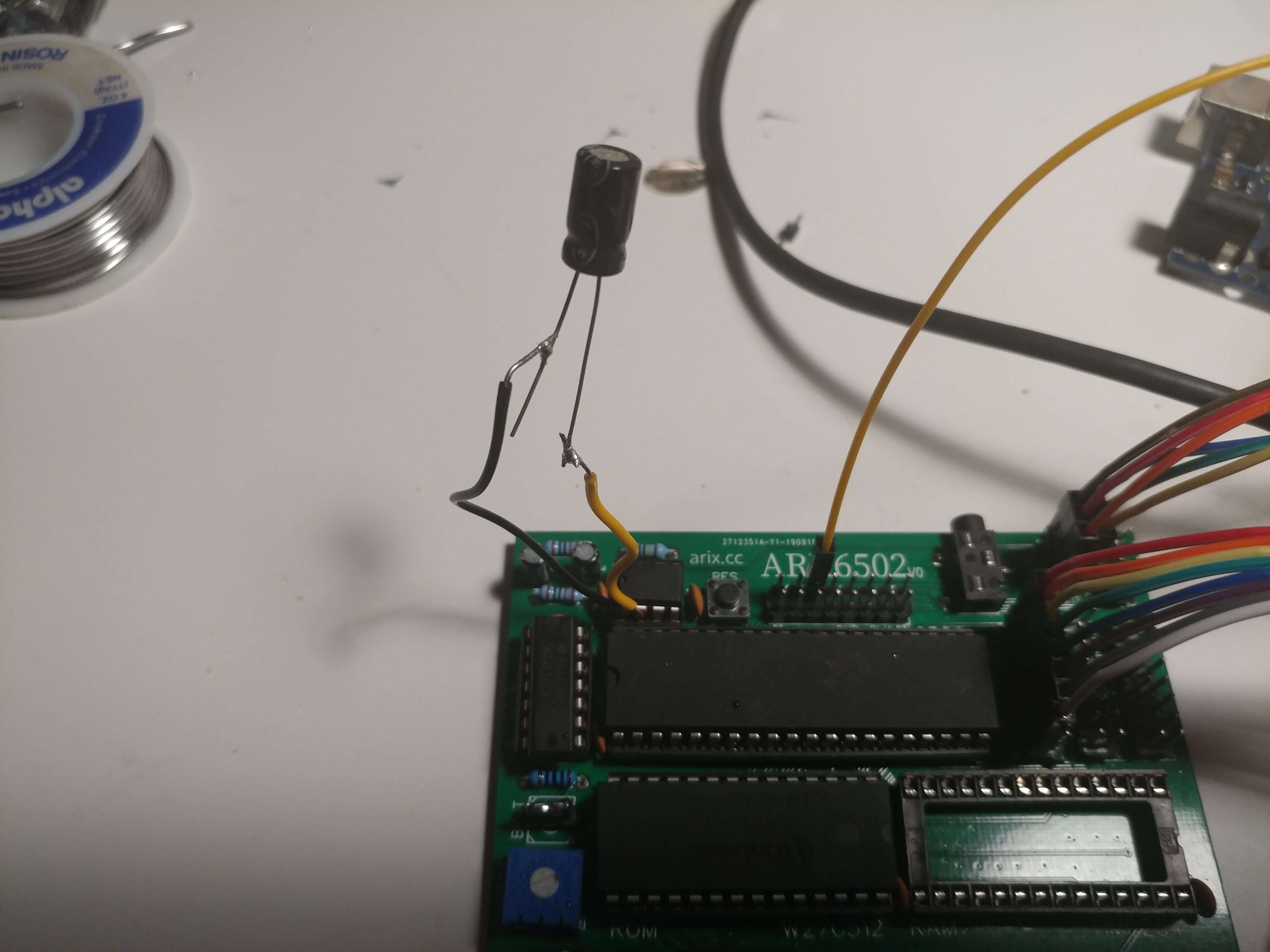 Large capacitor hanging off of the board